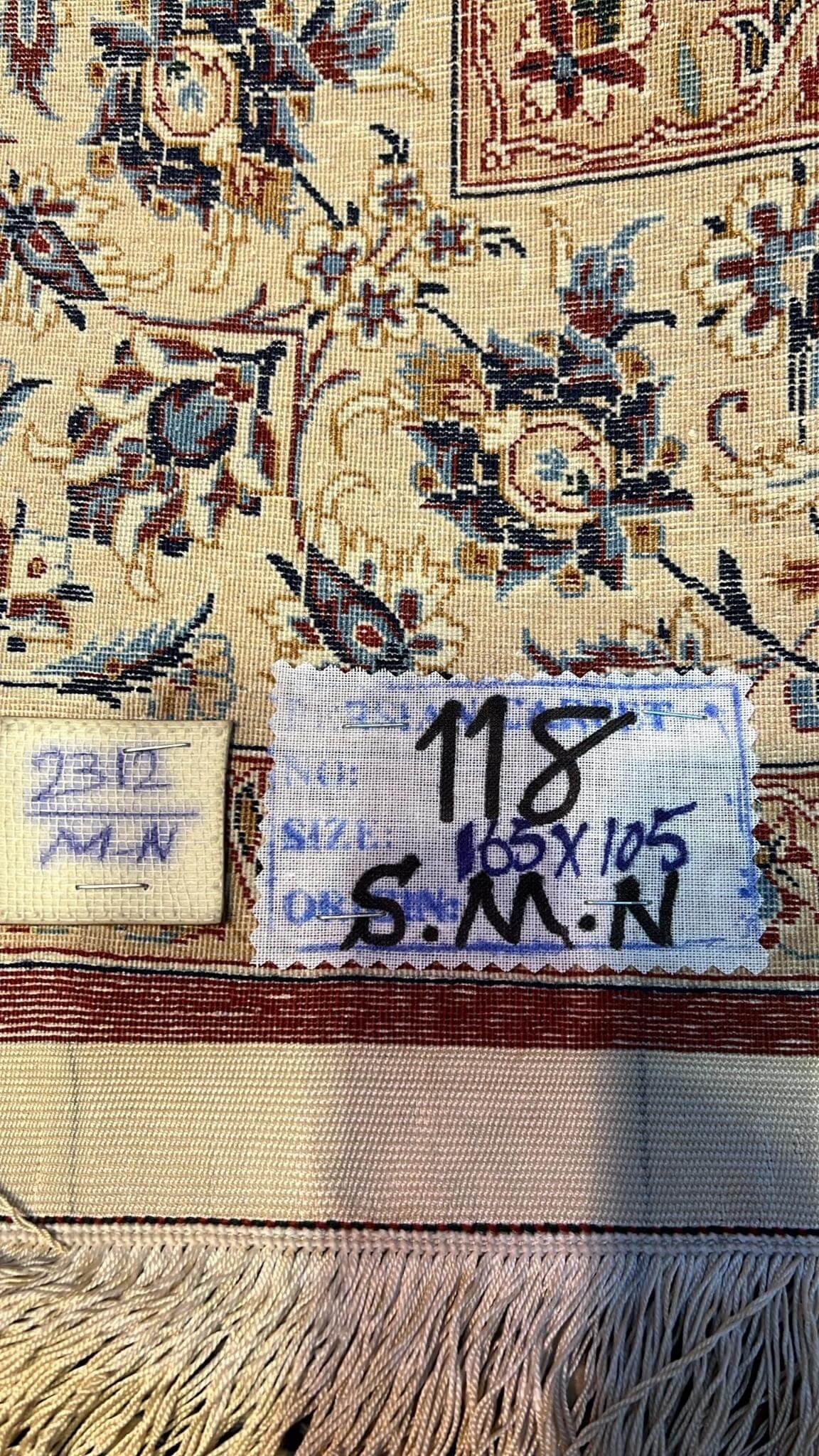 "Backside view of the Seirafian Isfahan rug, highlighting the fine craftsmanship and knot density of 1,210,000 knots per square meter.